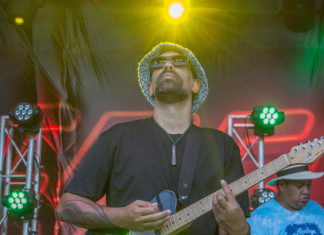 Dallas Tamaira on guitar and vocals. Crowds enjoyed two sell-out shows under clear Waiheke skies. Photo Jake Legge