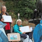 Huhana Davis and Sue Pawley getting the last signatures at Matiatia Thursday 23 May TR 02